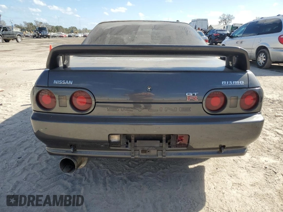 1990 Nissan Skyline z VIN BNR32010431, wystawiony jako Copart lot #78496994 z przebiegiem 182 401 mil mil oraz Nie do naprawy • Non repairable. Historia ofert i sprzedaży dostępna na DreamBid. Obrazek 6.
