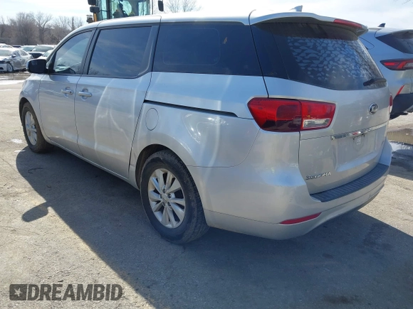 2016 Kia Sedona L with VIN KNDMA5C17G6103195, listed as a IAAI auction lot 41663528 with 322,257 mi miles. Bid and sale history available at carsss.com. Image 3.