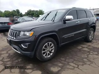 2014 Jeep Grand Cherokee Limited with VIN 1C4RJFBG7EC546642, listed as a Copart auction lot 61445615 with 128,921 mi miles and Salvage title. Bid and sale history available at DreamBid. Image 1.