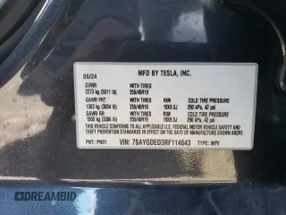 2024 Tesla Model Y with VIN 7SAYGDED3RF114643, listed as a Copart auction lot 56557075 with 3,021 mi miles and Salvage Title. Bid and sale history available at DreamBid. Image 12.