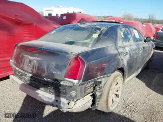 2015 Chrysler 300 with VIN 2C3CCABG4FH803066, listed as a IAAI auction lot 36694920 with 103,660 mi miles. Bid and sale history available at carsss.com. Image 4.