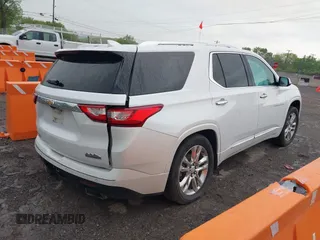 2018 Chevrolet Traverse High Country with VIN 1GNEVKKW4JJ133786, listed as a IAAI auction lot 42076685 with 167,787 mi miles and . Bid and sale history available at DreamBid. Image 4.
