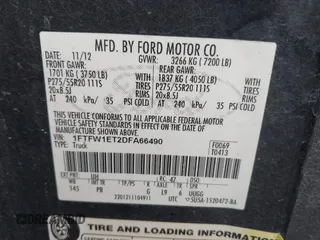 2013 Ford F-150 XL with VIN 1FTFW1ET2DFA66490, listed as a IAAI auction lot 41565863 with 215,421 mi miles. Bid and sale history available at carsss.com. Image 9.