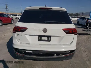 2020 Volkswagen Tiguan SE z VIN 3VV3B7AX6LM107732, wystawiony jako Copart lot #52038695 z przebiegiem 27 317 mil mil oraz Szkoda całkowita • Salvage title. Historia ofert i sprzedaży dostępna na DreamBid. Obrazek 6.