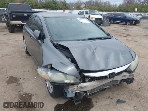 2011 Honda Civic LX with VIN 19XFA1F54BE032699, listed as a IAAI auction lot 42060272 with 197,905 mi miles and . Bid and sale history available at DreamBid. Image 1.
