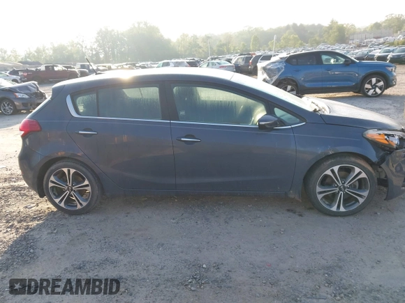 2016 Kia Forte EX z VIN KNAFX5A86G5527820, wystawiony jako IAAI lot #42148974 z przebiegiem 73 103 mil mil oraz . Historia ofert i sprzedaży dostępna na DreamBid. Obrazek 13.