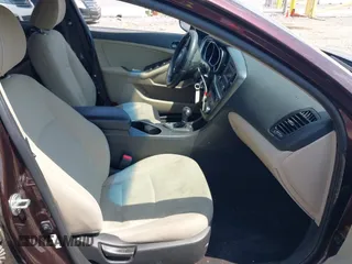 2015 Kia Optima LX with VIN 5XXGM4A70FG478819, listed as a IAAI auction lot 42571214 with 130,707 mi miles and . Bid and sale history available at DreamBid. Image 5.
