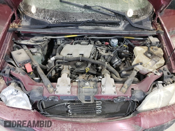 2004 Chevrolet Venture LS z VIN 1GNDX03E84D152859, wystawiony jako Copart lot #61352482 z przebiegiem 161 091 mil mil oraz Szkoda całkowita • Salvage title. Historia ofert i sprzedaży dostępna na DreamBid. Obrazek 7.