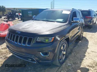 2014 Jeep Grand Cherokee Overland with VIN 1C4RJECG8EC409976, listed as a IAAI auction lot 41821685 with 186,105 mi miles. Bid and sale history available at carsss.com. Image 17.