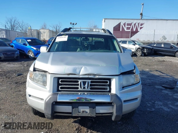 2006 Honda Ridgeline RTL z VIN 2HJYK165X6H570027, wystawiony jako IAAI lot #41868389 z przebiegiem 207 020 mil mil oraz . Historia ofert i sprzedaży dostępna na DreamBid. Obrazek 12.
