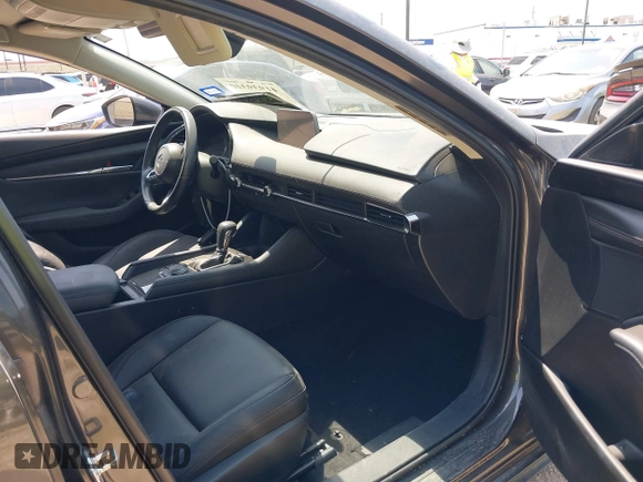 2021 Mazda 3 Preferred with VIN JM1BPACL1M1317639, listed as a IAAI auction lot 41939340 with 51,195 mi miles and . Bid and sale history available at DreamBid. Image 5.