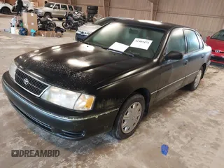 1998 Toyota Avalon XL with VIN 4T1BF18B7WU246141, listed as a IAAI auction lot 41405474 with 266,384 mi miles and . Bid and sale history available at DreamBid. Image 2.