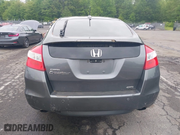 2010 Honda Crosstour EX-L z VIN 5J6TF2H55AL008306, wystawiony jako IAAI lot #42353784 z przebiegiem 209 410 mil mil oraz . Historia ofert i sprzedaży dostępna na DreamBid. Obrazek 16.