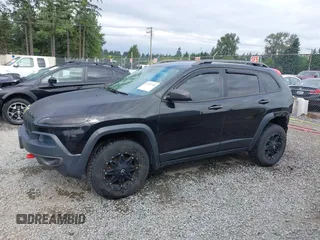 2014 Jeep Cherokee Trailhawk z VIN 1C4PJMBB1EW145683, wystawiony jako IAAI lot #42487730 z przebiegiem 148 277 mil mil oraz . Historia ofert i sprzedaży dostępna na DreamBid. Obrazek 15.