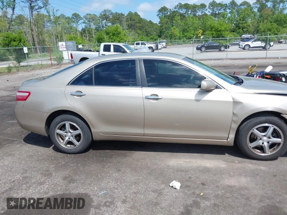 2009 Toyota Camry with VIN 4T1BE46K49U299939, listed as a IAAI auction lot 42012226 with 141,302 mi miles. Bid and sale history available at carsss.com. Image 13.
