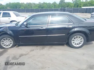 2010 Chrysler 300 Touring with VIN 2C3CA5CV3AH195530, listed as a IAAI auction lot 42103512 with 291,724 mi miles and . Bid and sale history available at DreamBid. Image 14.