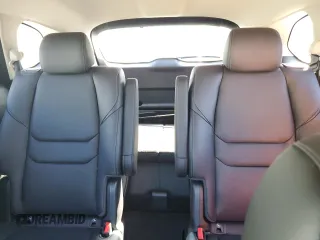 2023 Mazda CX-9 Touring с VIN JM3TCBCY6P0641298, выставлен на аукционе Copart как лот 58683415 с пробегом 16 754 миль миль и Списание • Salvage title. История ставок и продаж доступна на DreamBid. Изображение 10.