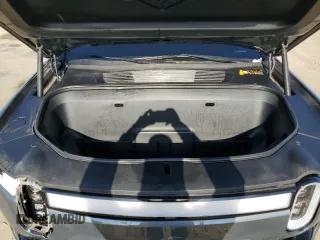 2022 Rivian R1T Adventure z VIN 7FCTGAAA9NN008771, wystawiony jako Copart lot #56243835 z przebiegiem 31 006 mil mil oraz Szkody całkowita. Historia ofert i sprzedaży dostępna na DreamBid. Obrazek 11.