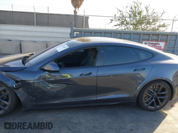 2021 Tesla Model S Long Range with VIN 5YJSA1E53MF436865, listed as a IAAI auction lot 41384837 with 20,829 mi miles and . Bid and sale history available at DreamBid. Image 13.