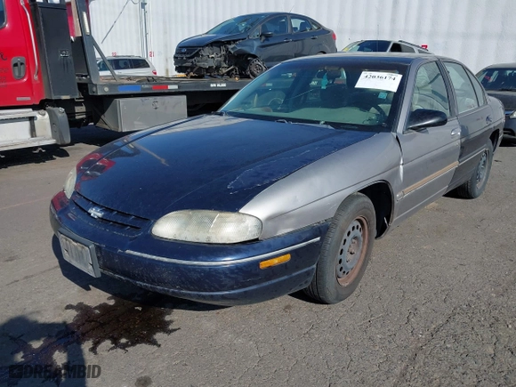 2000 Chevrolet Lumina with VIN 2G1WL52J7Y1355941, listed as a IAAI auction lot 42007306 with 309,954 mi miles. Bid and sale history available at carsss.com. Image 2.