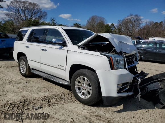 2015 GMC Yukon SLT with VIN 1GKS2BKC4FR143581, listed as a Copart auction lot 50591645 with 0 mi miles and Salvage Title. Bid and sale history available at carsss.com. Image 4.