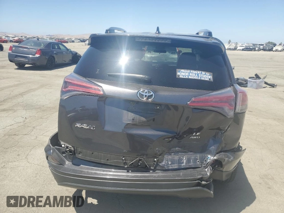 2018 Toyota RAV4 LE z VIN JTMBFREV8JJ259069, wystawiony jako Copart lot #61106715 z przebiegiem 56 770 mil mil oraz Szkoda całkowita • Salvage title. Historia ofert i sprzedaży dostępna na DreamBid. Obrazek 6.