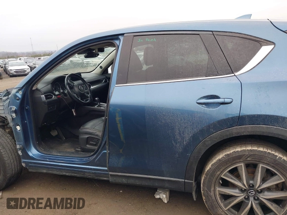 2017 Mazda CX-5 Grand Touring with VIN JM3KFADL9H0187338, listed as a IAAI auction lot 41382034 with 141,972 mi miles and . Bid and sale history available at carsss.com. Image 15.