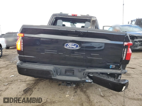 2024 Ford F-150 Lightning Flash z VIN 1FT6W3L73RWG21830, wystawiony jako Copart lot #43161725 z przebiegiem 23 mil mil oraz Czysty tytuł • Clean title. Historia ofert i sprzedaży dostępna na DreamBid. Obrazek 6.