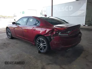 2019 Dodge Charger SXT with VIN 2C3CDXJG0KH757909, listed as a IAAI auction lot 41597907 with 71,882 mi miles and . Bid and sale history available at DreamBid. Image 3.