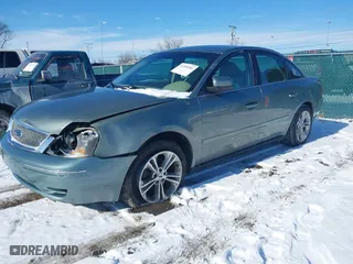 2006 Ford Five Hundred SE with VIN 1FAFP23146G119696, listed as a IAAI auction lot 41599381 with 184,040 mi miles. Bid and sale history available at carsss.com. Image 2.