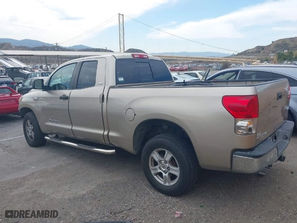 2007 Toyota Tundra SR5 with VIN 5TFRV54197X031872, listed as a IAAI auction lot 41593418 with 246,426 mi miles. Bid and sale history available at carsss.com. Image 3.