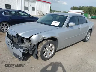 2006 Chrysler 300 Touring with VIN 2C3KA53G26H459048, listed as a IAAI auction lot 42049103 with 256,564 mi miles. Bid and sale history available at carsss.com. Image 2.