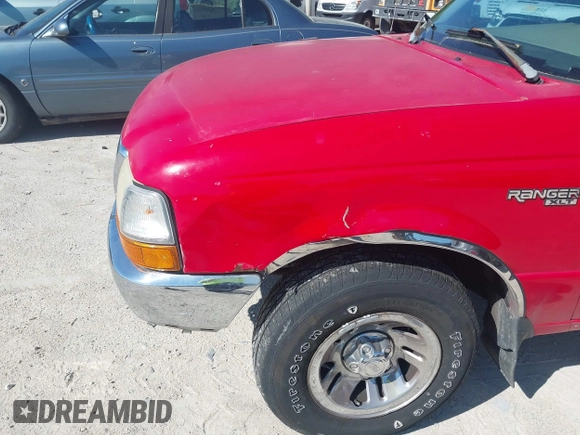 1999 Ford Ranger XL with VIN 1FTYR14V3XTA79077, listed as a IAAI auction lot 42126637 with 220,432 mi miles and . Bid and sale history available at DreamBid. Image 13.