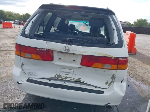 2004 Honda Odyssey EX-L with VIN 5FNRL18074B109717, listed as a IAAI auction lot 37731273 with 314,449 mi miles and . Bid and sale history available at DreamBid. Image 16.