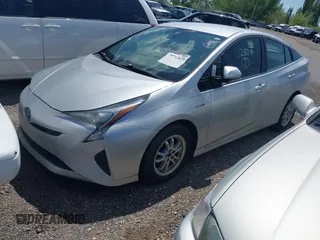2018 Toyota Prius Two with VIN JTDKBRFU3J3068097, listed as a IAAI auction lot 42178684 with 335,391 mi miles and . Bid and sale history available at DreamBid. Image 2.