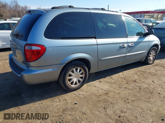 2003 Chrysler Town & Country LX with VIN 2C4GP44L73R238380, listed as a IAAI auction lot 41705420 with 129,225 mi miles and . Bid and sale history available at DreamBid. Image 4.
