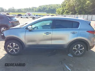 2020 Kia Sportage LX z VIN KNDPMCAC8L7628865, wystawiony jako IAAI lot #42190291 z przebiegiem 72 646 mil mil oraz . Historia ofert i sprzedaży dostępna na DreamBid. Obrazek 14.