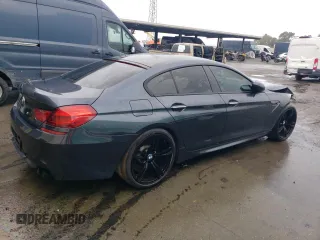 2015 BMW M6 z VIN WBS6C9C5XFD467854, wystawiony jako Copart lot #86177724 z przebiegiem 55 789 mil mil oraz Szkoda całkowita • Salvage title. Historia ofert i sprzedaży dostępna na DreamBid. Obrazek 3.