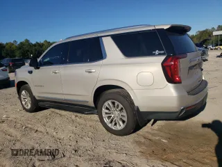 2021 GMC Yukon SLT with VIN 1GKS1BKDXMR435793, listed as a Copart auction lot 76443834 with 71,027 mi miles and Salvage Title. Bid and sale history available at carsss.com. Image 2.