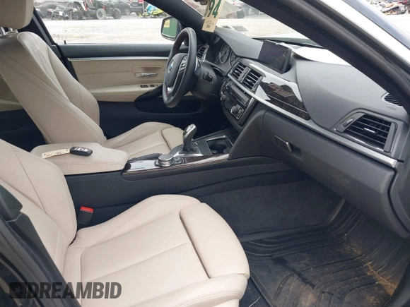 2016 BMW 4 Series 428i xDrive z VIN WBA4C9C51GG139038, wystawiony jako IAAI lot #42247629 z przebiegiem 48 388 mil mil oraz . Historia ofert i sprzedaży dostępna na DreamBid. Obrazek 5.