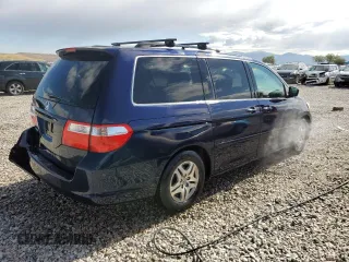 2006 Honda Odyssey EX z VIN 5FNRL38496B023830, wystawiony jako Copart lot #57497265 z przebiegiem 123 839 mil mil oraz Szkoda całkowita • Salvage title. Historia ofert i sprzedaży dostępna na DreamBid. Obrazek 3.