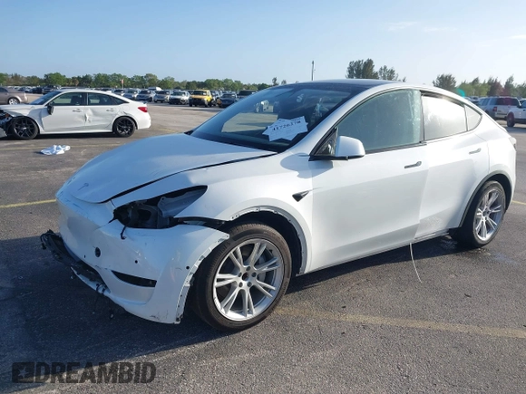 2021 Tesla Model Y Standard Range with VIN 5YJYGDED3MF103650, listed as a IAAI auction lot 41726278 with Not Provided miles and . Bid and sale history available at DreamBid. Image 2.
