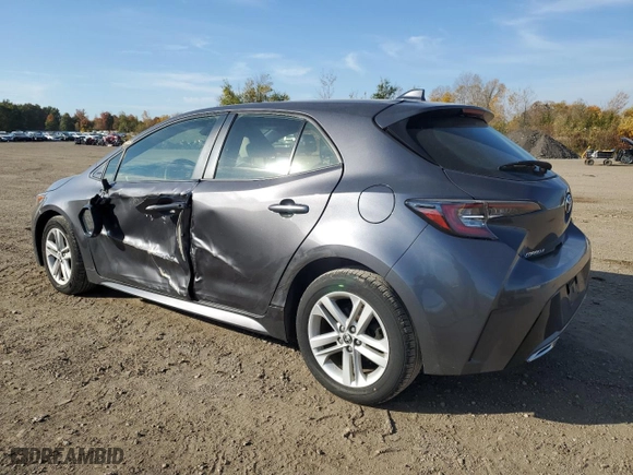 2022 Toyota Corolla Hatchback SE with VIN JTND4MBE1N3158709, listed as a Copart auction lot 77452694 with 74,299 mi miles and Salvage Title. Bid and sale history available at carsss.com. Image 2.