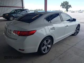 2014 Acura ILX with VIN 19VDE1F35EE013425, listed as a IAAI auction lot 42649299 with 102,589 mi miles and . Bid and sale history available at DreamBid. Image 4.
