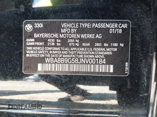 2018 BMW 3 Series 330i with VIN WBA8B9G58JNV00184, listed as a IAAI auction lot 42136004 with 109,896 mi miles. Bid and sale history available at carsss.com. Image 9.
