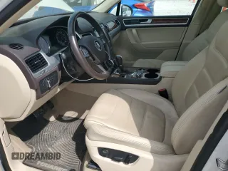 2013 Volkswagen Touareg Lux with VIN WVGEF9BP9DD008658, listed as a Copart auction lot 52585925 with 93,369 mi miles and Salvage Title. Bid and sale history available at DreamBid. Image 7.