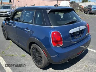 2015 MINI Hardtop 4 Door with VIN WMWXS5C5XFT831166, listed as a Copart auction lot 56714285 with 69,668 mi miles and Salvage Title. Bid and sale history available at DreamBid. Image 3.
