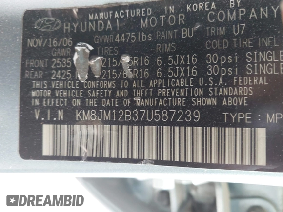 2007 Hyundai Tucson GLS with VIN KM8JM12B37U587239, listed as a IAAI auction lot 41787475 with 215,772 mi miles. Bid and sale history available at carsss.com. Image 9.
