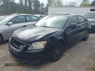 2010 Toyota Avalon XL with VIN 4T1BK3DB8AU358260, listed as a IAAI auction lot 41942640 with 230,584 mi miles and . Bid and sale history available at carsss.com. Image 17.
