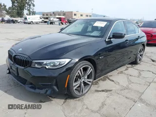 2022 BMW 3 Series 330e with VIN 3MW5P7J06N8C50460, listed as a IAAI auction lot 41688267 with 27,707 mi miles. Bid and sale history available at carsss.com. Image 2.
